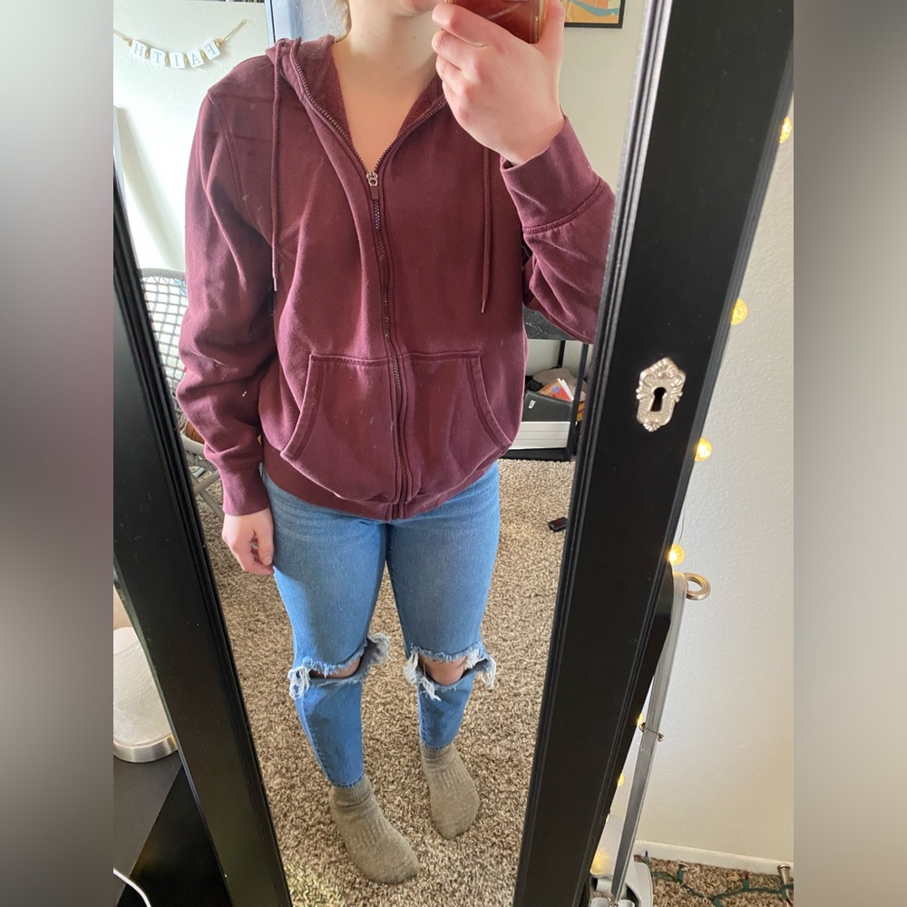 Maroon zip up hoodie. Size M